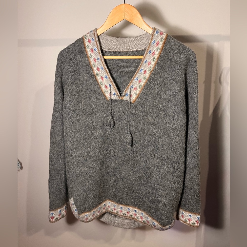 Nordic lace up sweater with colourful detailing